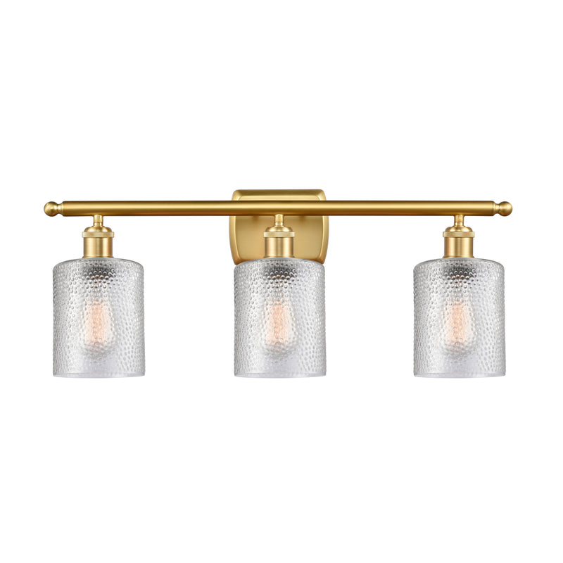 Cobbleskill Bath Vanity Light shown in the Satin Gold finish with a Clear shade