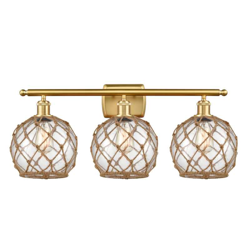 Farmhouse Rope Bath Vanity Light shown in the Satin Gold finish with a Clear Glass with Brown Rope shade