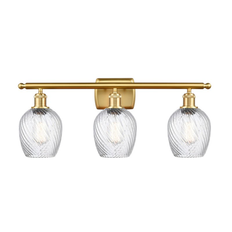 Salina Bath Vanity Light shown in the Satin Gold finish with a Clear Spiral Fluted shade