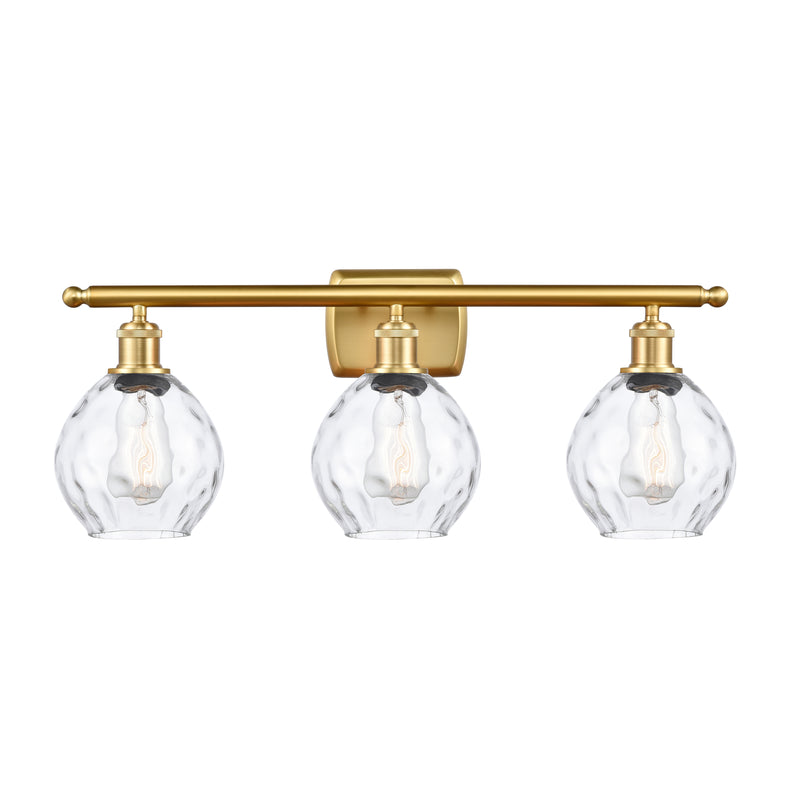 Waverly Bath Vanity Light shown in the Satin Gold finish with a Clear shade