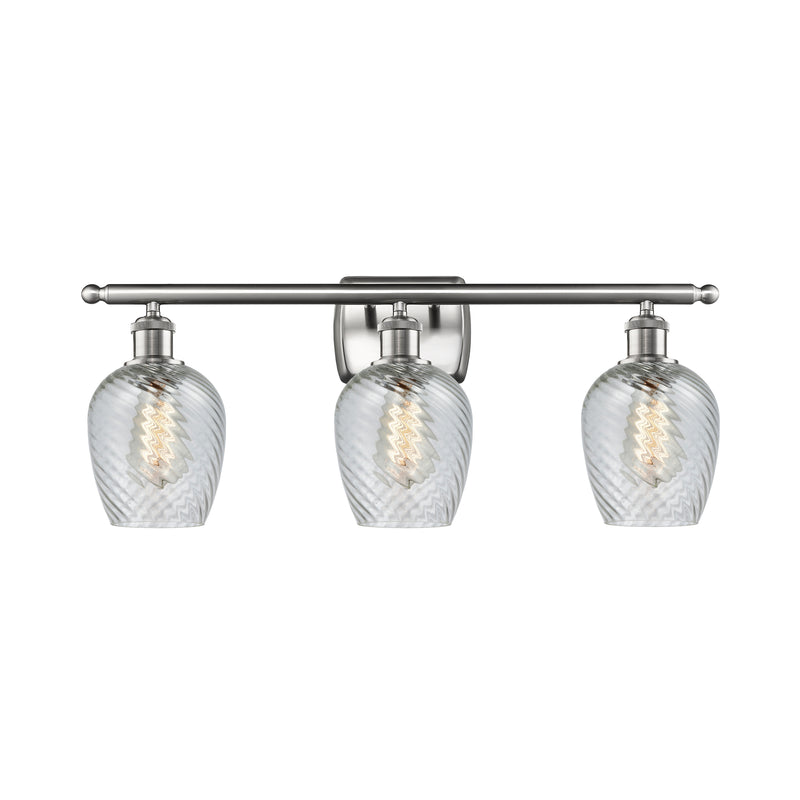 Salina Bath Vanity Light shown in the Brushed Satin Nickel finish with a Clear Spiral Fluted shade
