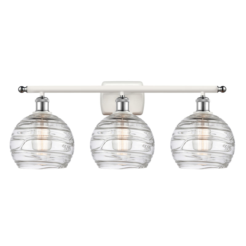 Deco Swirl Bath Vanity Light shown in the White and Polished Chrome finish with a Clear shade