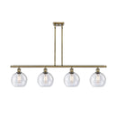 Athens Island Light shown in the Antique Brass finish with a Seedy shade