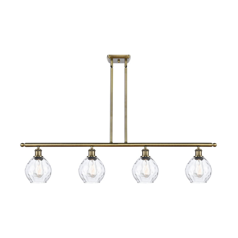 Waverly Island Light shown in the Antique Brass finish with a Clear shade