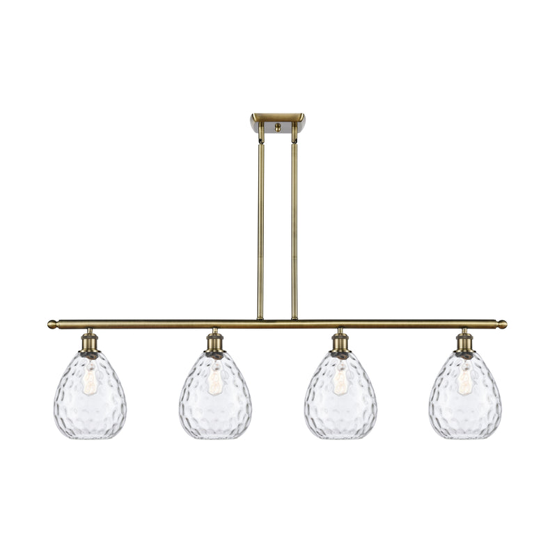 Waverly Island Light shown in the Antique Brass finish with a Clear shade