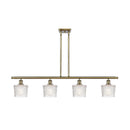 Niagra Island Light shown in the Antique Brass finish with a Clear shade