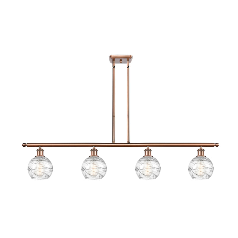 Deco Swirl Island Light shown in the Antique Copper finish with a Clear shade