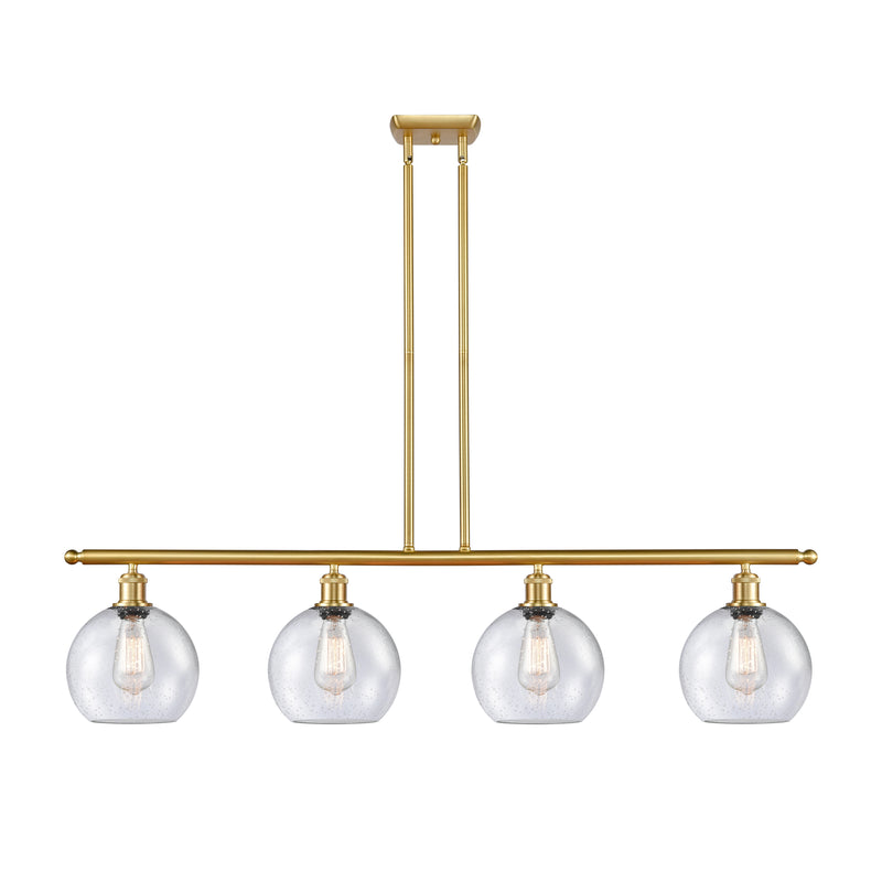 Athens Island Light shown in the Satin Gold finish with a Seedy shade