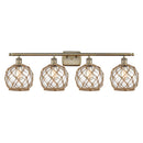 Farmhouse Rope Bath Vanity Light shown in the Antique Brass finish with a Clear Glass with Brown Rope shade