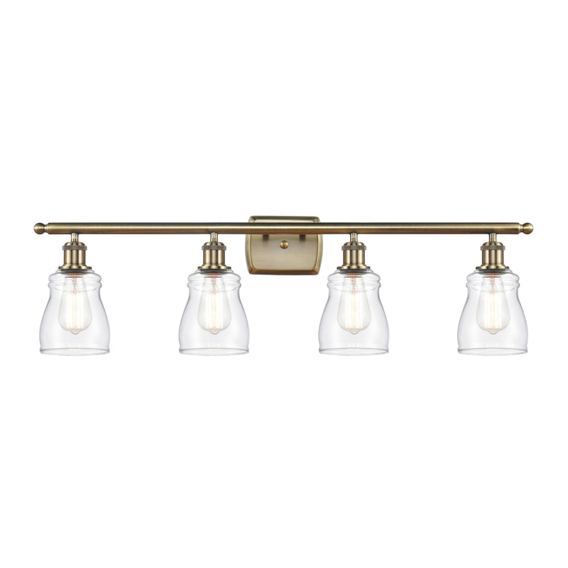 Ellery Bath Vanity Light shown in the Antique Brass finish with a Clear shade