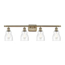 Ellery Bath Vanity Light shown in the Antique Brass finish with a Seedy shade