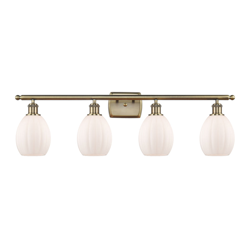 Eaton Bath Vanity Light shown in the Antique Brass finish with a Matte White shade