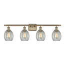 Eaton Bath Vanity Light shown in the Antique Brass finish with a Clear shade