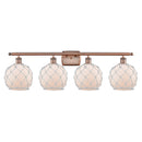 Farmhouse Rope Bath Vanity Light shown in the Antique Copper finish with a White Glass with White Rope shade