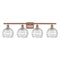 Deco Swirl Bath Vanity Light shown in the Antique Copper finish with a Clear shade