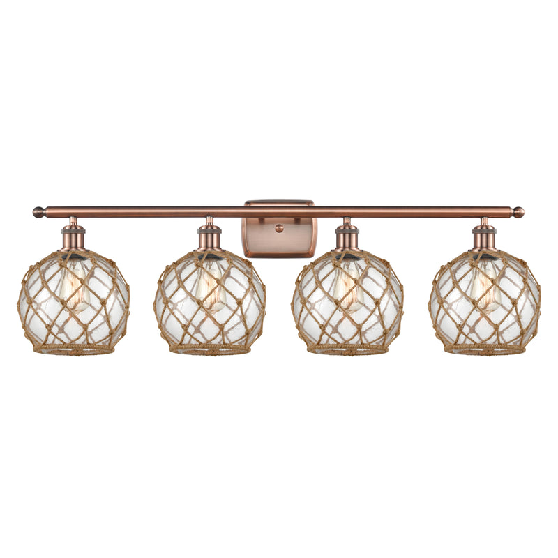Farmhouse Rope Bath Vanity Light shown in the Antique Copper finish with a Clear Glass with Brown Rope shade