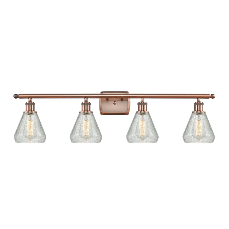 Conesus Bath Vanity Light shown in the Antique Copper finish with a Clear Crackle shade