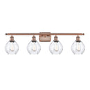 Waverly Bath Vanity Light shown in the Antique Copper finish with a Clear shade