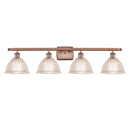 Arietta Bath Vanity Light shown in the Antique Copper finish with a Clear shade