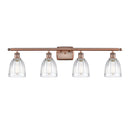 Brookfield Bath Vanity Light shown in the Antique Copper finish with a Clear shade