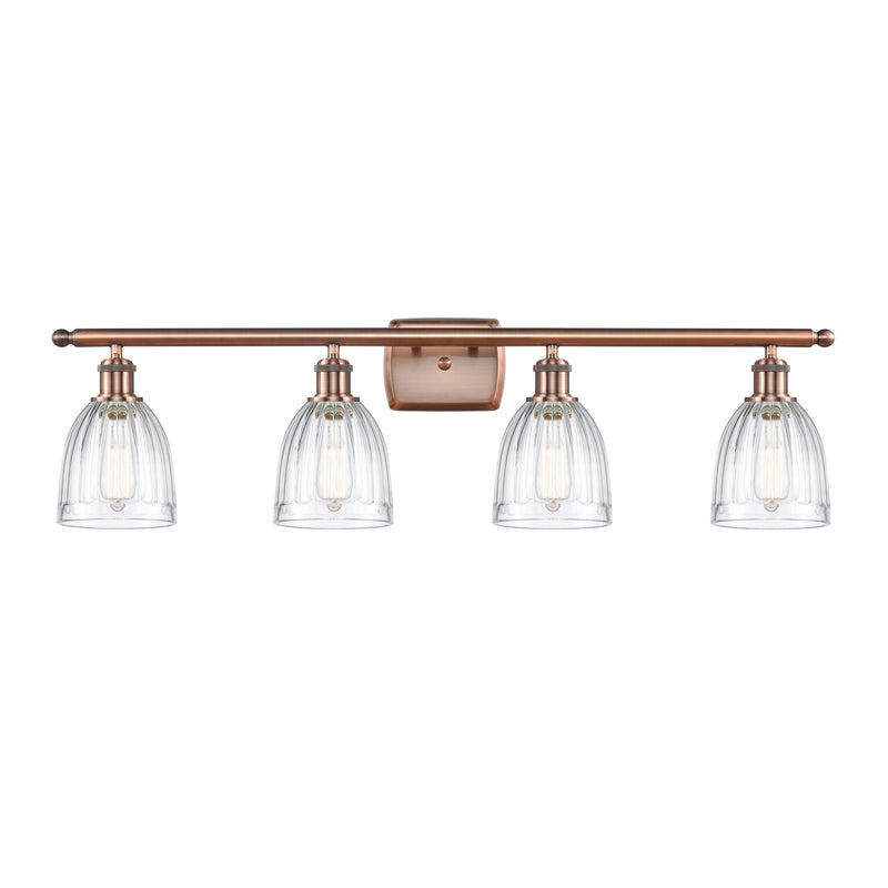 Brookfield Bath Vanity Light shown in the Antique Copper finish with a Clear shade