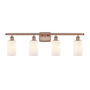 Clymer Bath Vanity Light shown in the Antique Copper finish with a Matte White shade