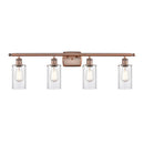 Clymer Bath Vanity Light shown in the Antique Copper finish with a Clear shade