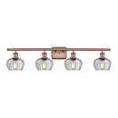 Fenton Bath Vanity Light shown in the Antique Copper finish with a Clear shade