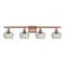 Fenton Bath Vanity Light shown in the Antique Copper finish with a Clear shade