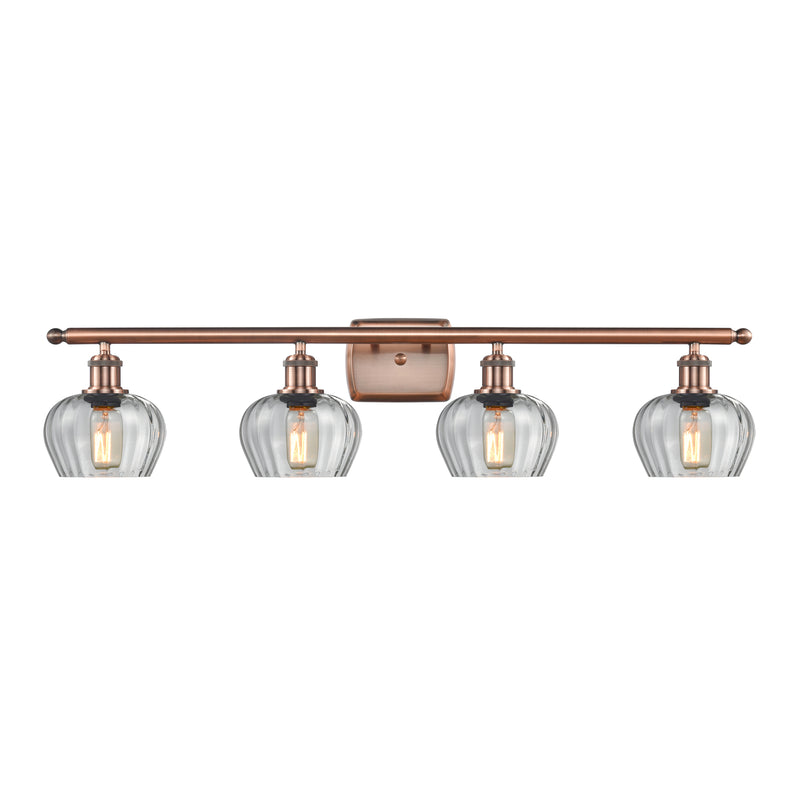 Fenton Bath Vanity Light shown in the Antique Copper finish with a Clear shade