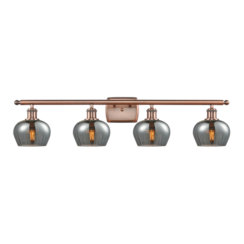 Fenton Bath Vanity Light shown in the Antique Copper finish with a Plated Smoke shade