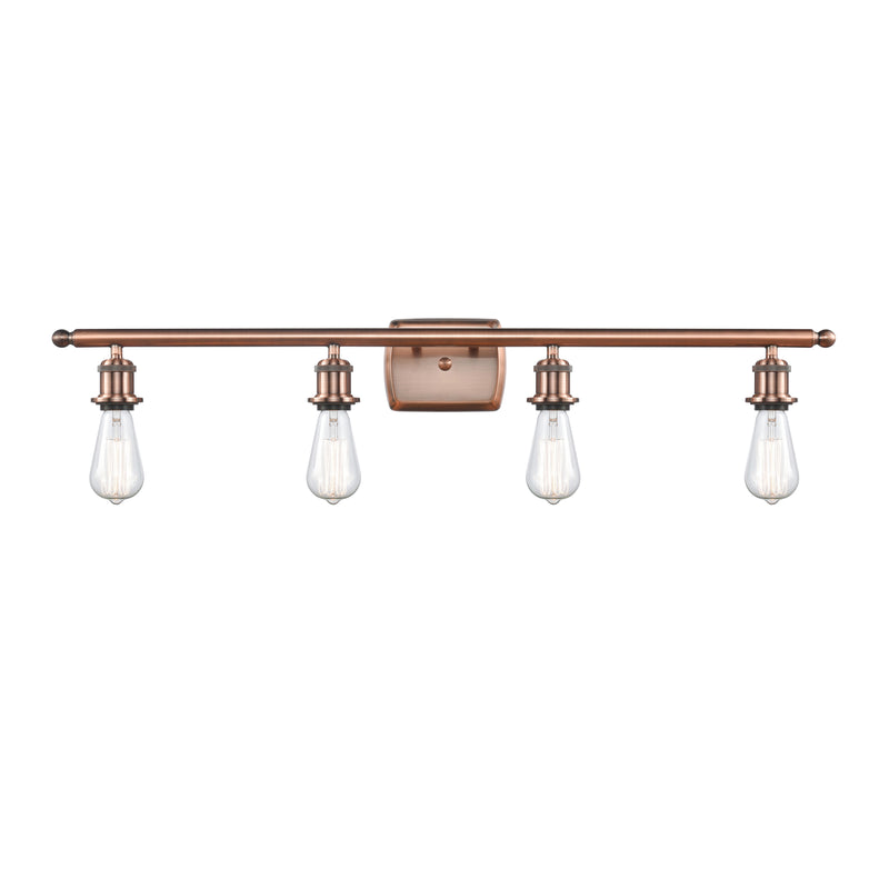 Bare Bulb Bath Vanity Light shown in the Antique Copper finish