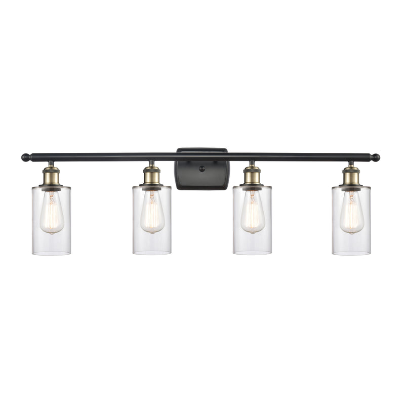 Clymer Bath Vanity Light shown in the Black Antique Brass finish with a Clear shade