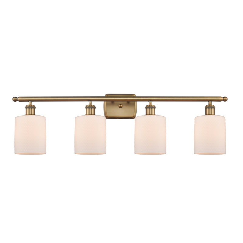 Cobbleskill Bath Vanity Light shown in the Brushed Brass finish with a Matte White shade