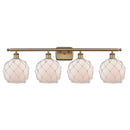 Farmhouse Rope Bath Vanity Light shown in the Brushed Brass finish with a White Glass with White Rope shade