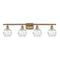 Deco Swirl Bath Vanity Light shown in the Brushed Brass finish with a Clear shade