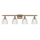 Castile Bath Vanity Light shown in the Brushed Brass finish with a Clear shade