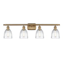 Brookfield Bath Vanity Light shown in the Brushed Brass finish with a Clear shade