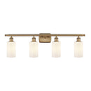 Clymer Bath Vanity Light shown in the Brushed Brass finish with a Matte White shade