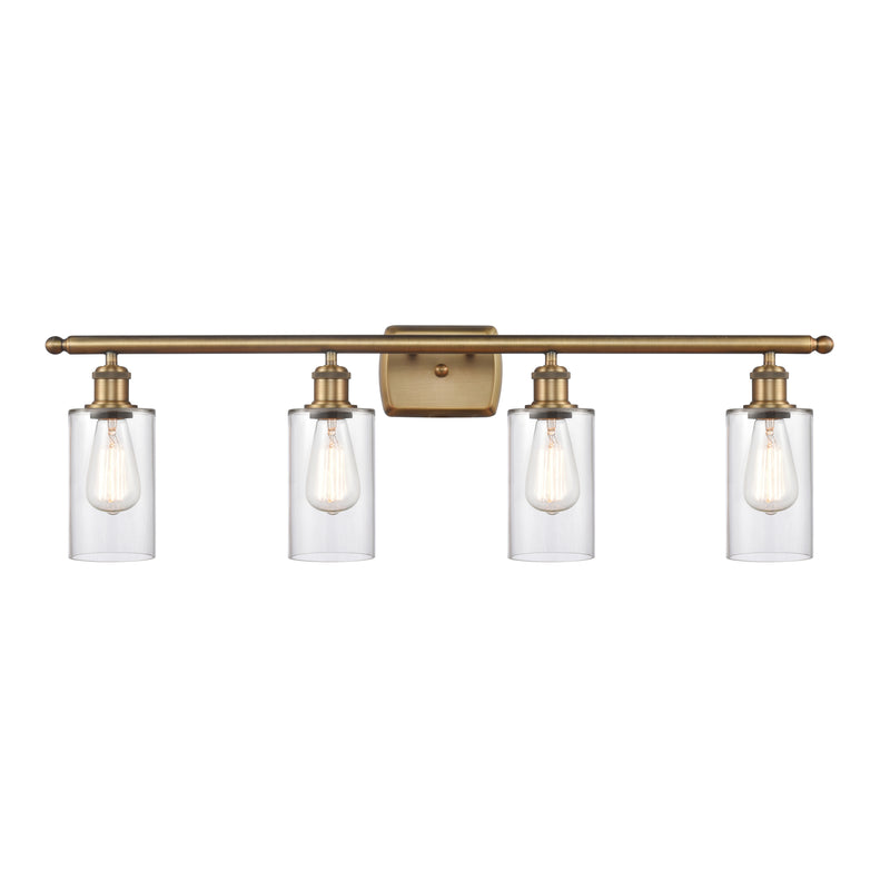 Clymer Bath Vanity Light shown in the Brushed Brass finish with a Clear shade