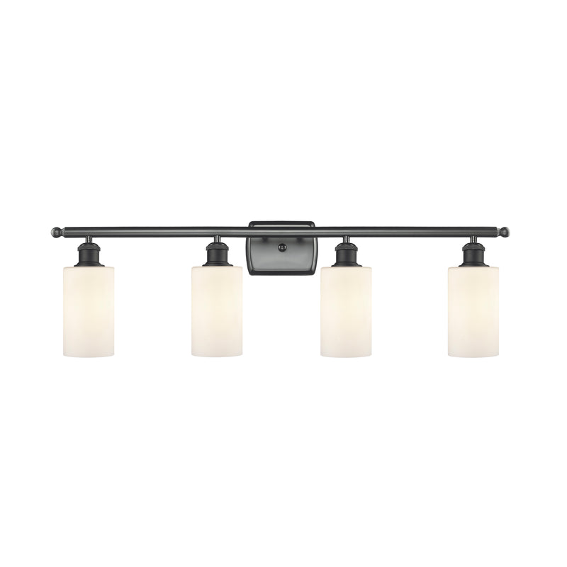 Clymer Bath Vanity Light shown in the Matte Black finish with a Matte White shade