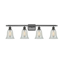 Hanover Bath Vanity Light shown in the Oil Rubbed Bronze finish with a Mouchette shade