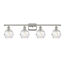 Deco Swirl Bath Vanity Light shown in the Polished Nickel finish with a Clear shade