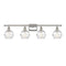 Deco Swirl Bath Vanity Light shown in the Polished Nickel finish with a Clear shade