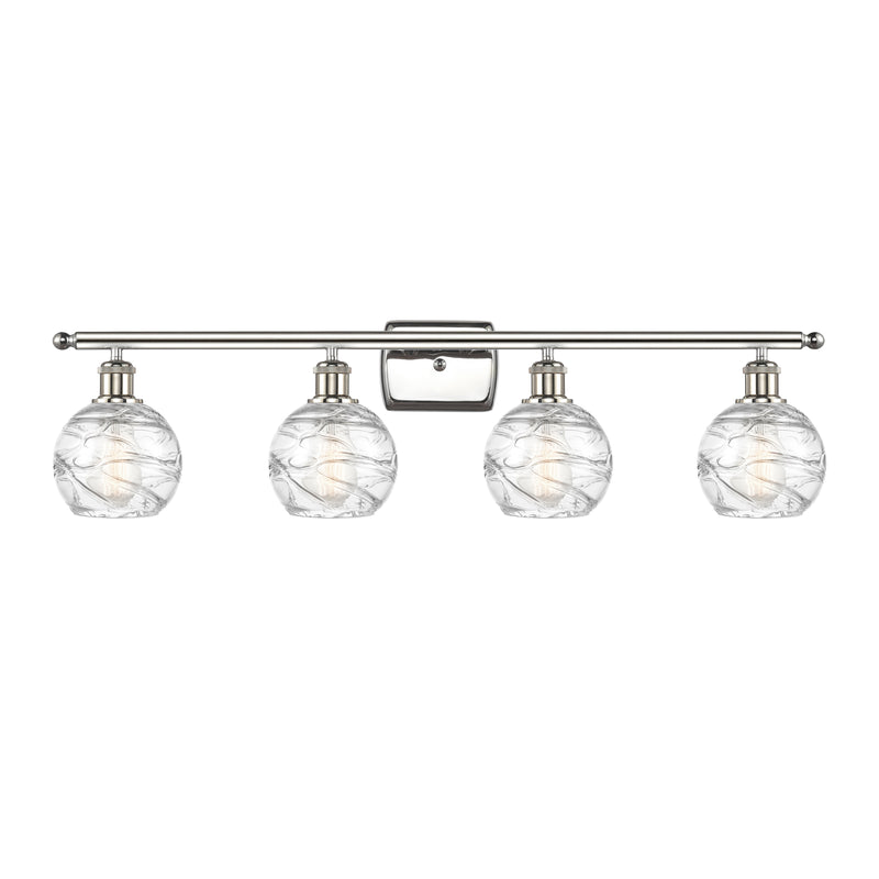 Deco Swirl Bath Vanity Light shown in the Polished Nickel finish with a Clear shade