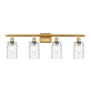 Candor Bath Vanity Light shown in the Satin Gold finish with a Clear Waterglass shade