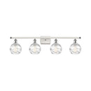 Deco Swirl Bath Vanity Light shown in the White and Polished Chrome finish with a Clear shade