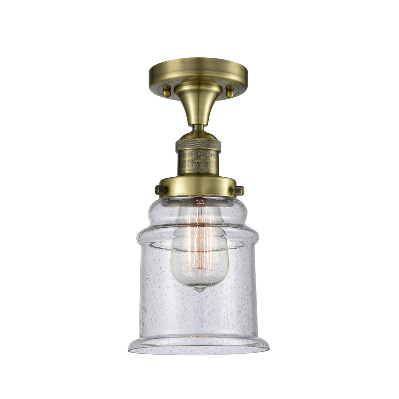 Canton Semi-Flush Mount shown in the Antique Brass finish with a Seedy shade