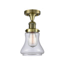 Bellmont Semi-Flush Mount shown in the Antique Brass finish with a Clear shade