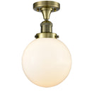 Beacon Semi-Flush Mount shown in the Antique Brass finish with a Matte White shade